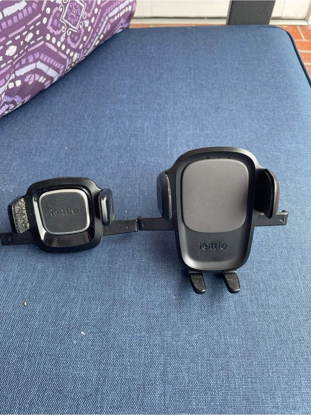 Tottie and Iottie black car phone holder